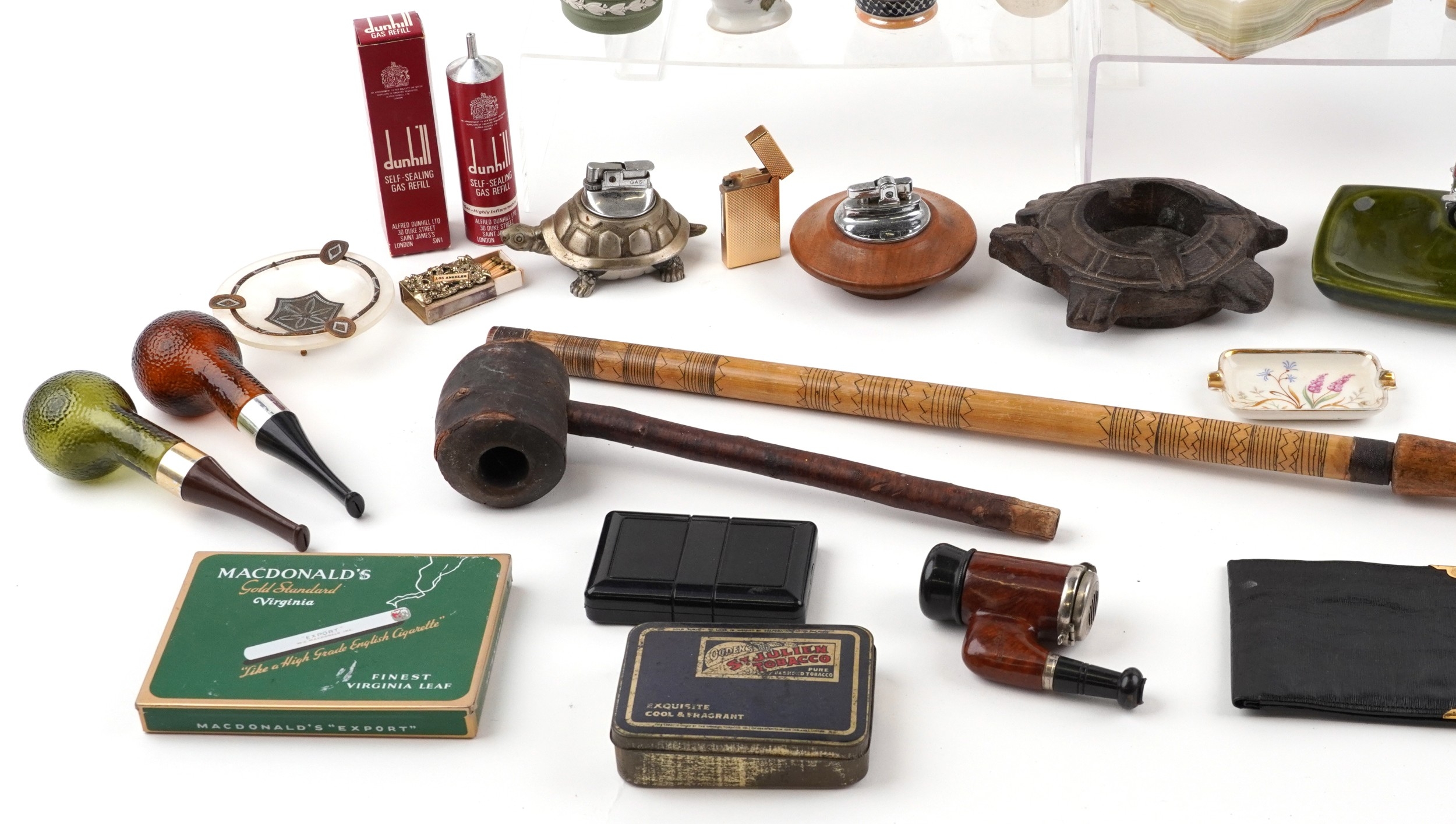 Smoking objects, some advertising, including glass ashtrays, onyx table ...