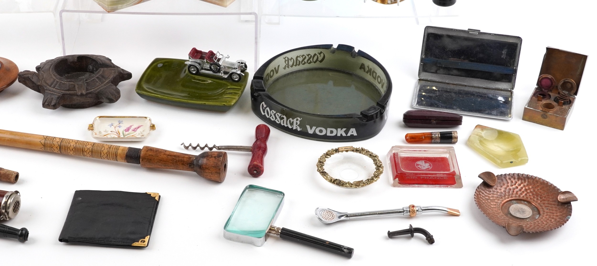 Smoking objects, some advertising, including glass ashtrays, onyx table ...