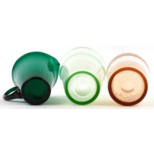 8 - Whitefriars, two controlled bubble glass vases and a green glass jug, the largest 25.5cm high.