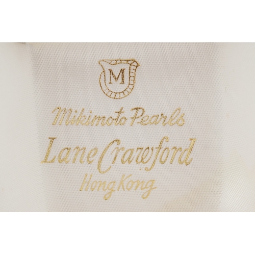  A 14K white gold cultured pearl and ruby ring with leaf design shoulders, size L, together with a pa... 