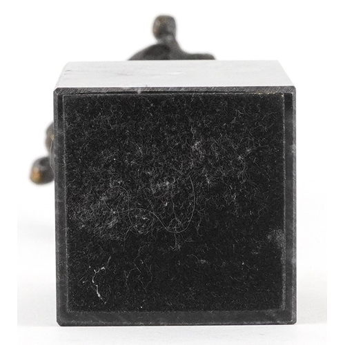 37 - A Corry Ammerlaan bronze figure group raised on a black granite base, 26cm high.