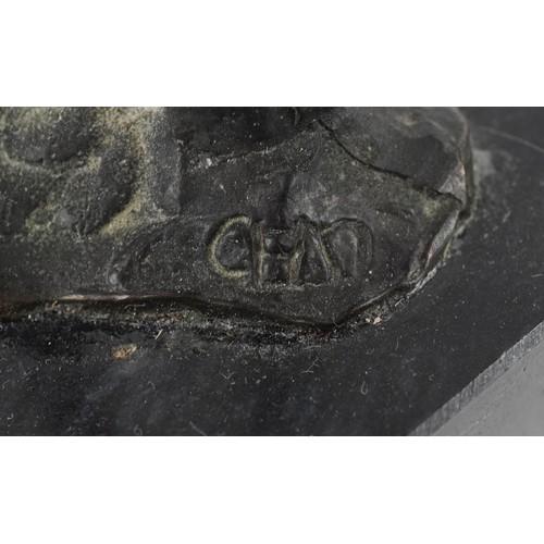 37 - A Corry Ammerlaan bronze figure group raised on a black granite base, 26cm high.