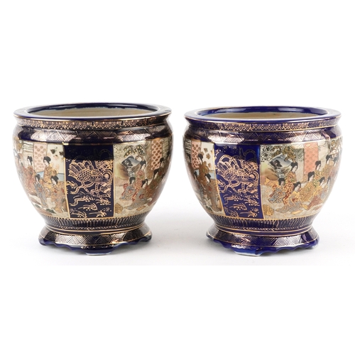 63 - A pair of Japanese Satsuma earthenware jardinières finely hand painted with panels of figures onto a... 