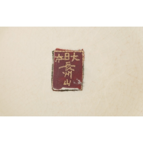 63 - A pair of Japanese Satsuma earthenware jardinières finely hand painted with panels of figures onto a... 