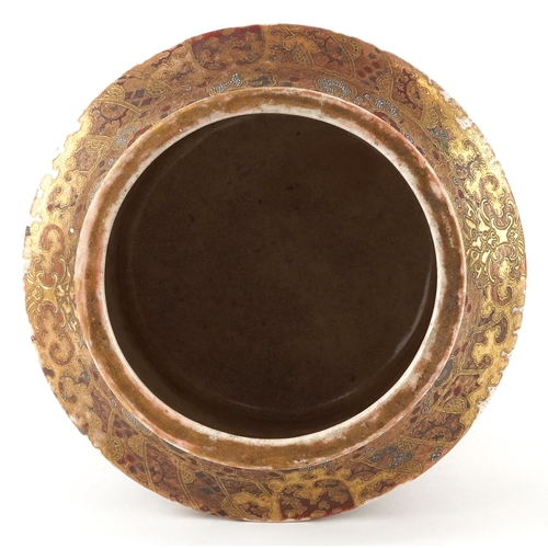 53 - A large Japanese Satsuma earthenware vase raised on three paw feet, finely hand painted with figures... 