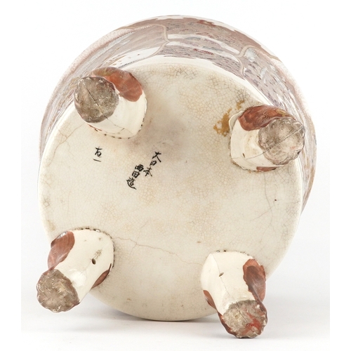 53 - A large Japanese Satsuma earthenware vase raised on three paw feet, finely hand painted with figures... 