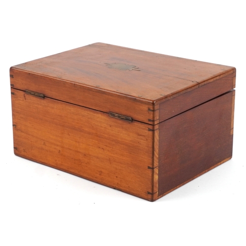 90 - A late George III mahogany apothecary cabinet housing a large collection of glass bottles with paper... 