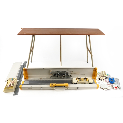 Two vintage Knitmaster knitting machines comprising Zippy-Plus and ...