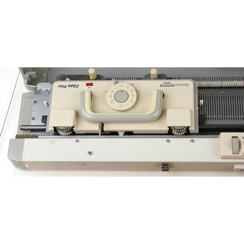 Two vintage Knitmaster knitting machines comprising Zippy-Plus and ...