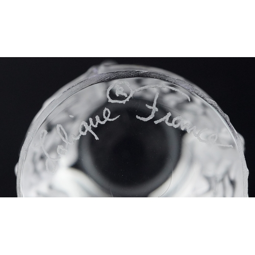 3 - Lalique, a frosted glass paperweight in the form of a Champagne cork, etched Lalique France to the b... 