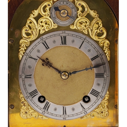 49 - An Edwardian inlaid mahogany dome top mantle clock having gilt dial and silvered chapter ring with R... 