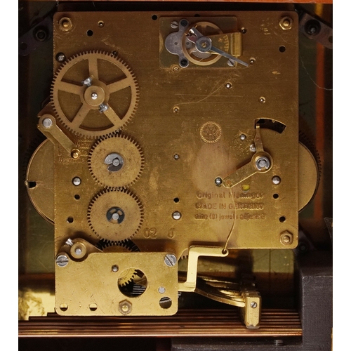 51 - A Kieninger walnut cased Westminster chiming bracket mantle clock having gilt dial and silvered chap... 
