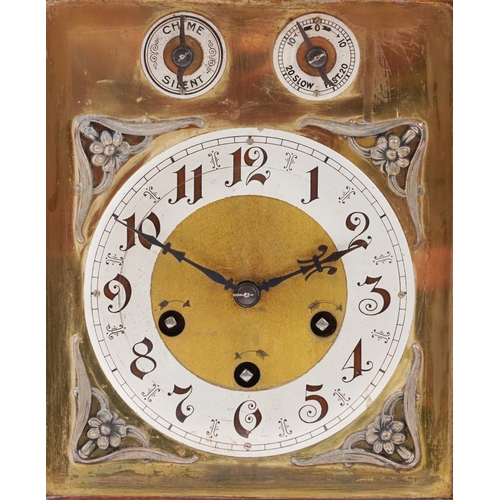 50 - Junghans, a mahogany cased mantle clock with Westminster chime having a silvered dial with Arabic nu... 
