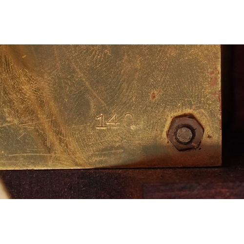 50 - Junghans, a mahogany cased mantle clock with Westminster chime having a silvered dial with Arabic nu... 