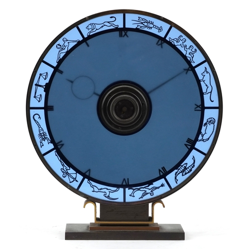 47 - Heinrich Möller for Kienzle, a blue glass zodiac mystery mantle clock, the brass frame pierced with ... 