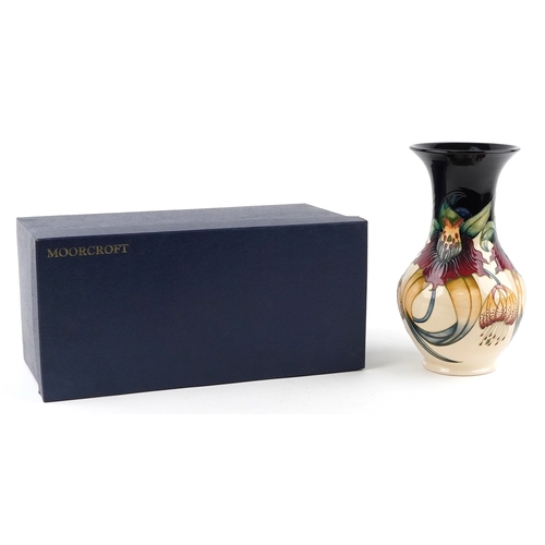 65 - Nicola Slaney for Moorcroft, a pottery vase hand painted and tube lined in the Anna Lily pattern, 33... 