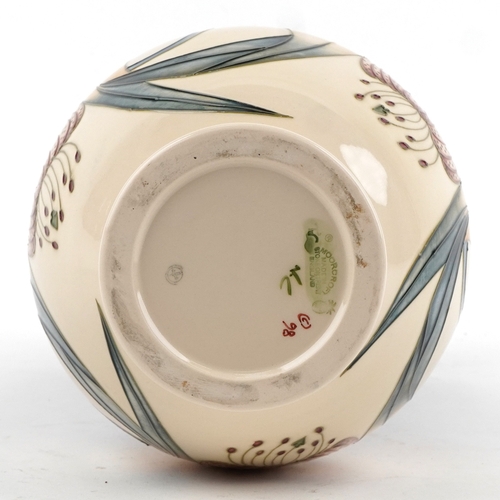 65 - Nicola Slaney for Moorcroft, a pottery vase hand painted and tube lined in the Anna Lily pattern, 33... 