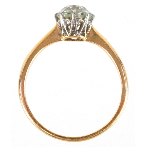 An 18ct gold blue stone solitaire ring, size Q, 2.8g.