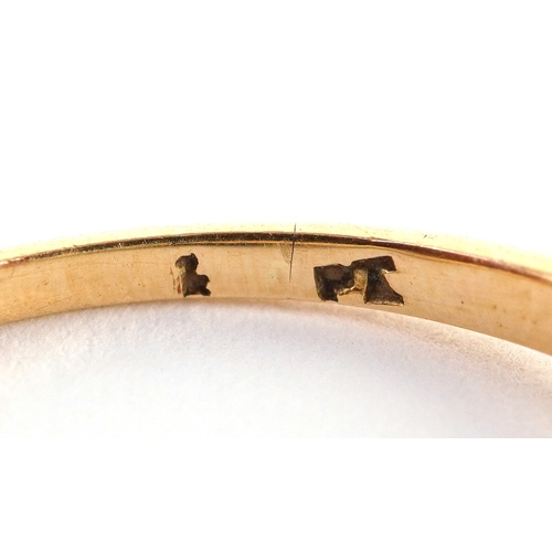An 18ct gold blue stone solitaire ring, size Q, 2.8g.