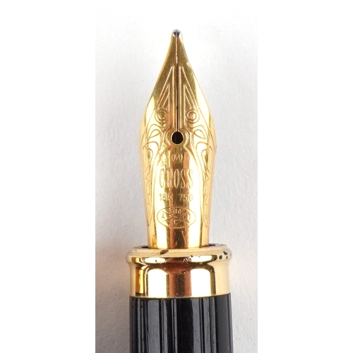 112 - An as new Cross fountain pen having an 18ct gold nib, with box.