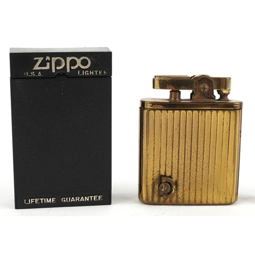 101 - Smoking items comprising a Zippo Harley Davidson lighter, a brass musical lighter and a white metal ... 