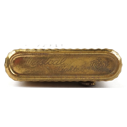 101 - Smoking items comprising a Zippo Harley Davidson lighter, a brass musical lighter and a white metal ... 