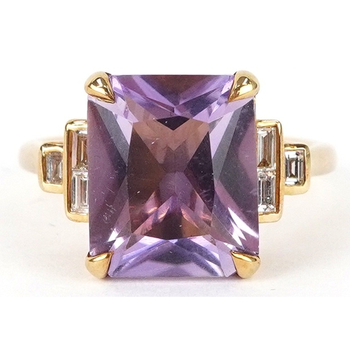 A 9K gold rectangular cut amethyst ring with baguette cut diamond ...