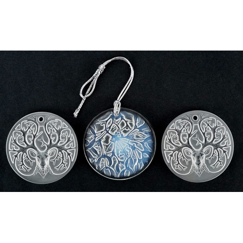 5 - Lalique France, three crystal Christmas tree decorations comprising two reindeer and opalescent mist... 