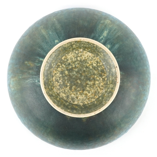 13 - Ruskin, an Arts & Crafts pottery fruit bowl having a green and blue mottled glaze, impressed marks t... 