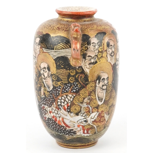 55 - A Japanese Satsuma earthenware miniature vase finely hand painted with figures, having twin dragon h... 