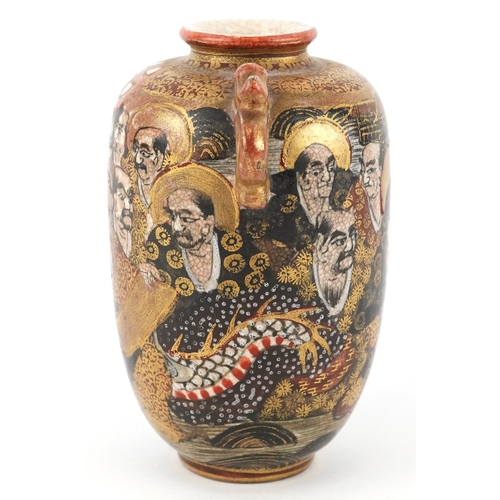 55 - A Japanese Satsuma earthenware miniature vase finely hand painted with figures, having twin dragon h... 