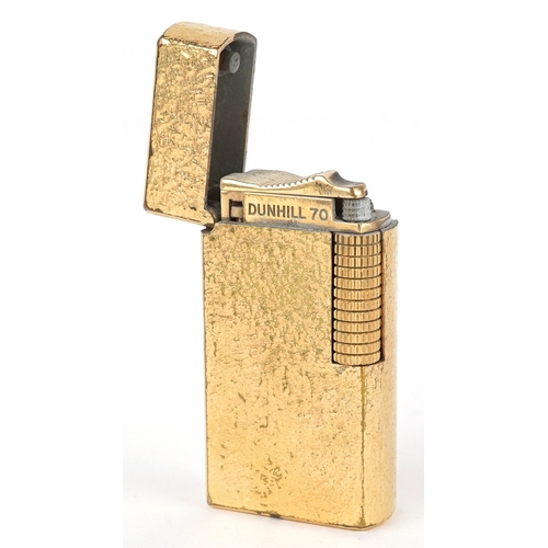 99 - Dunhill, a gold plated pocket lighter with box, 6cm high.