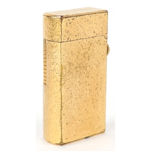 99 - Dunhill, a gold plated pocket lighter with box, 6cm high.