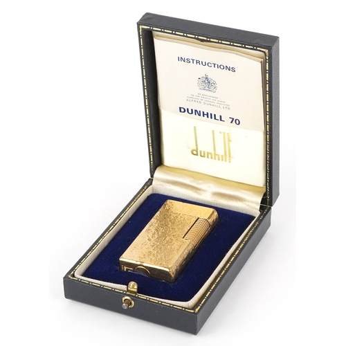 99 - Dunhill, a gold plated pocket lighter with box, 6cm high.