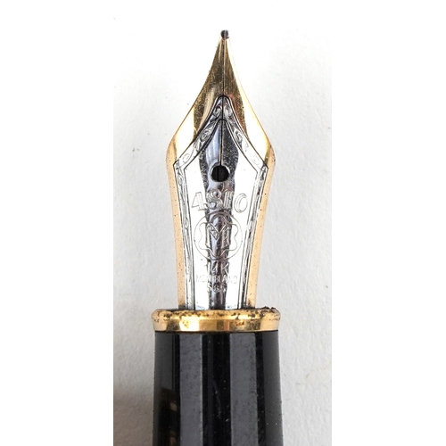 110 - Montblanc, two ballpoint pens and a fountain pen.