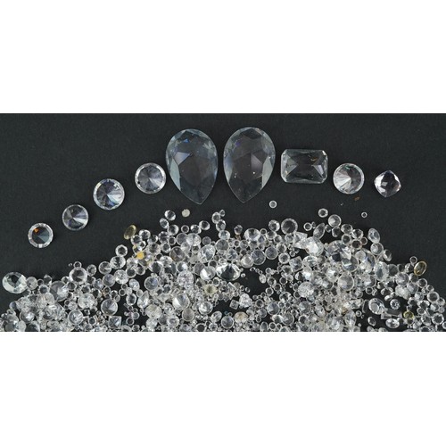 A collection of loose stones including diamond shards, the largest 2 ...