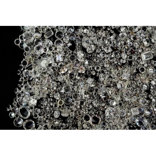 A collection of loose stones including diamond shards, the largest 2 ...
