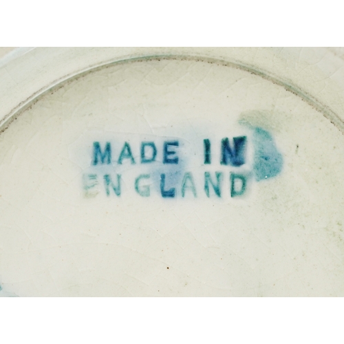 72 - Moorcroft, a hand painted Iris pattern pottery squat vase, impressed marks to the base, 7cm high.