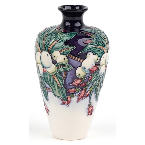 69 - Nicola Slaney for Moorcroft, a Snowberry pattern pottery vase inscribed 2002 to the base, 15.5cm hig... 