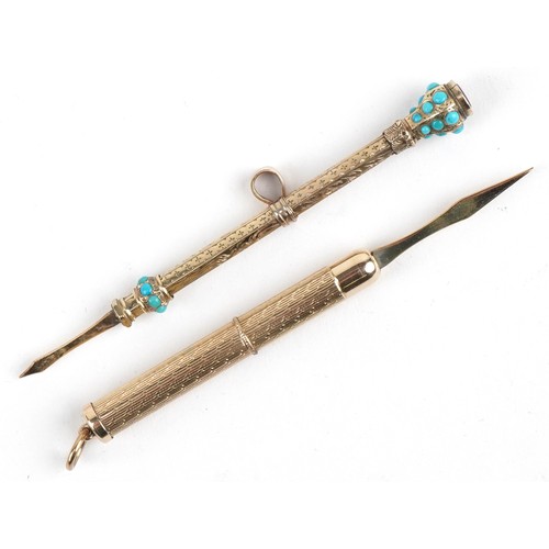 105 - An antique unmarked gold cased propelling toothpick set with turquoise cabochons and amethyst togeth... 
