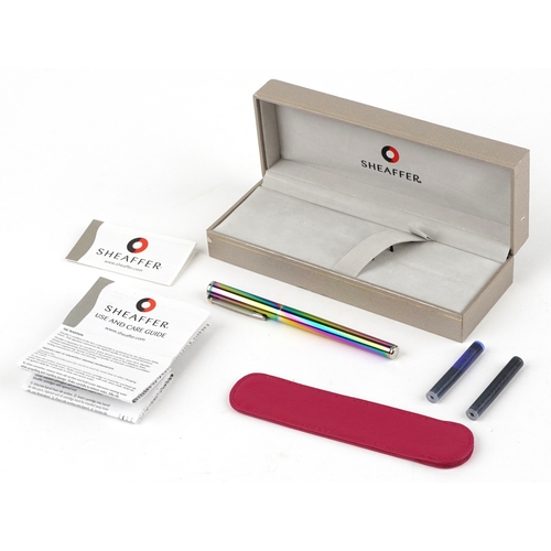 114 - Sheaffer, a Sheaffer Plasma rainbow fountain pen with box and paperwork.