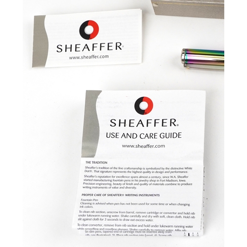 114 - Sheaffer, a Sheaffer Plasma rainbow fountain pen with box and paperwork.