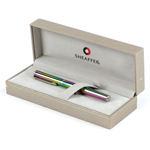 114 - Sheaffer, a Sheaffer Plasma rainbow fountain pen with box and paperwork.