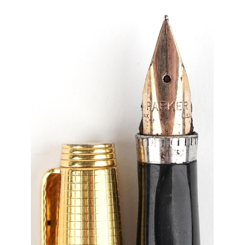 116 - A gold plated engine turned Parker fountain pen having a 14ct gold nib, 12.5cm in length, with box.