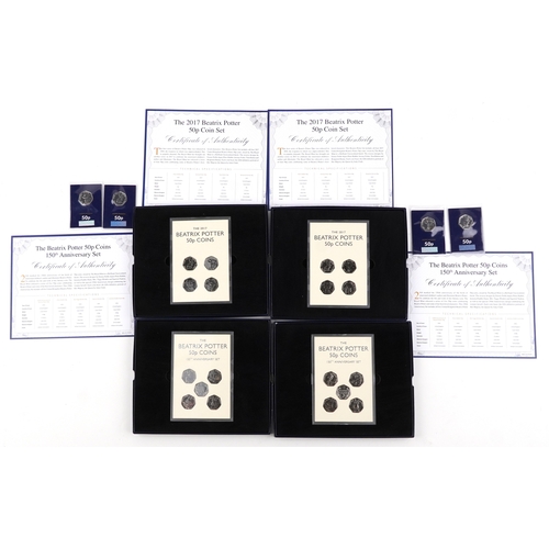 Four Beatrix 150th Anniversary fifty pence year coin sets comprising 2 ...