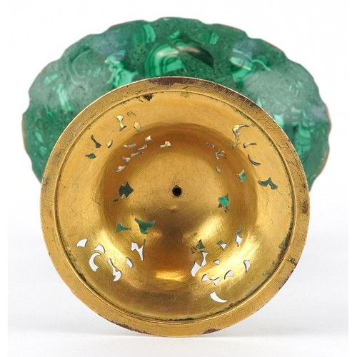38 - An antique gilt bronze and malachite tazza pierced with scrolling foliage and set with malachite cab... 