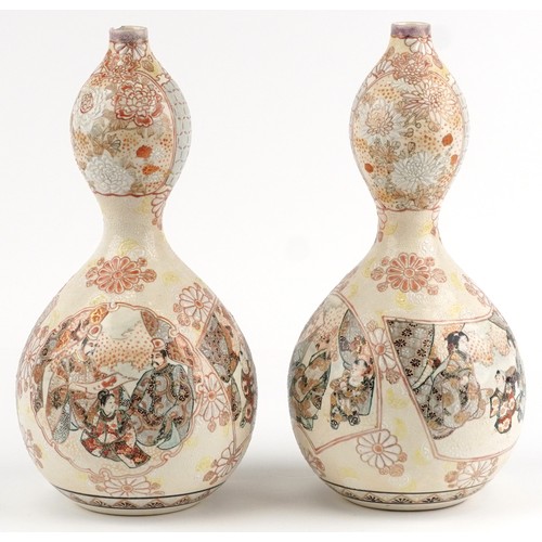 56 - A pair of Japanese Satsuma double gourd vases with hand painted cartouches of emperors, Geishas and ... 