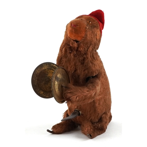 Vintage mechanical clockwork monkey with cymbals, 13cm high.