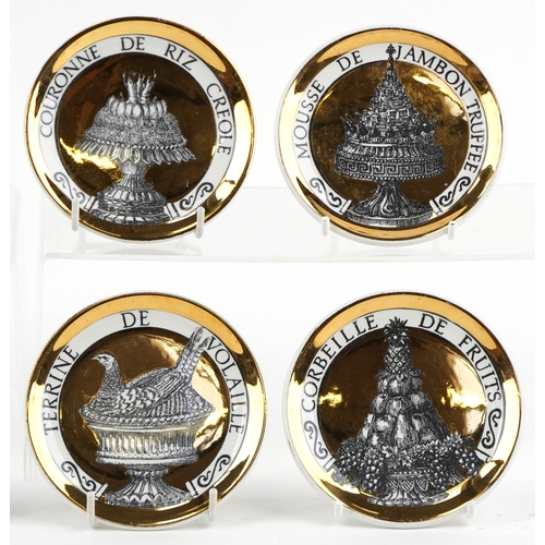  Fornasetti, set of eight Italian porcelain coasters from the Pranzo Alle Otto Series, 10cm in diamet... 