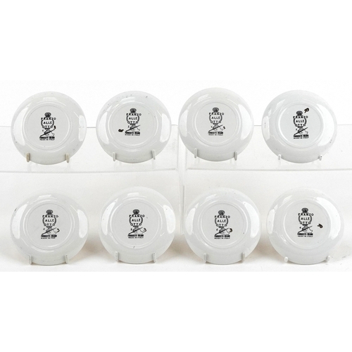  Fornasetti, set of eight Italian porcelain coasters from the Pranzo Alle Otto Series, 10cm in diamet... 